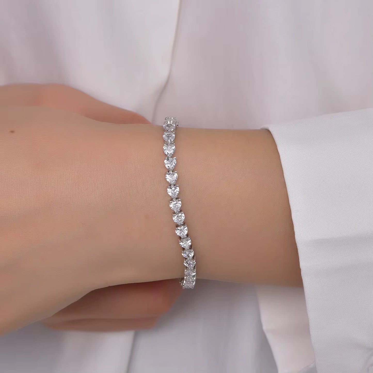 Jolie Bracelet Heart Tennis Style High Brilliance Stones in Sterling Silver